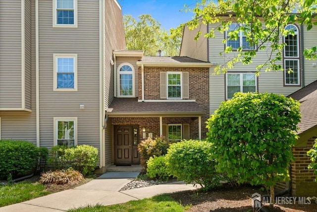 view of front of property with brick siding