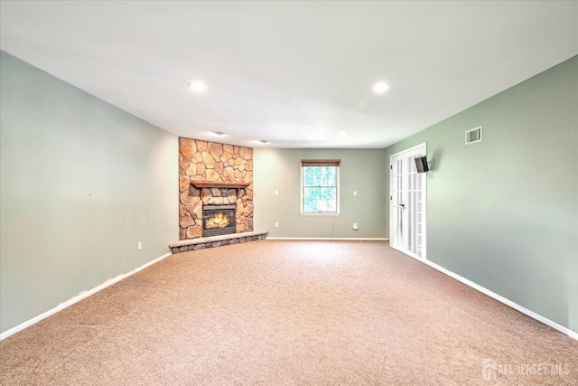7 Mill Rd, Jamesburg, NJ 08831 - unfurnished living room featuring carpet floors, baseboards, a stone fireplace, and recessed lighting