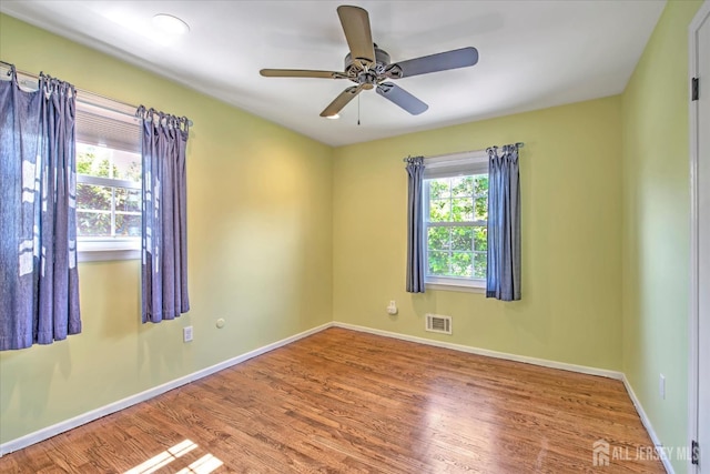 7 Mill Rd, Jamesburg, NJ 08831 - unfurnished room featuring wood finished floors, baseboards, and ceiling fan