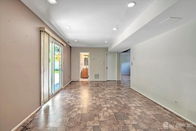 7 Mill Rd, Jamesburg, NJ 08831 - unfurnished room with baseboards, stone tile flooring, and recessed lighting
