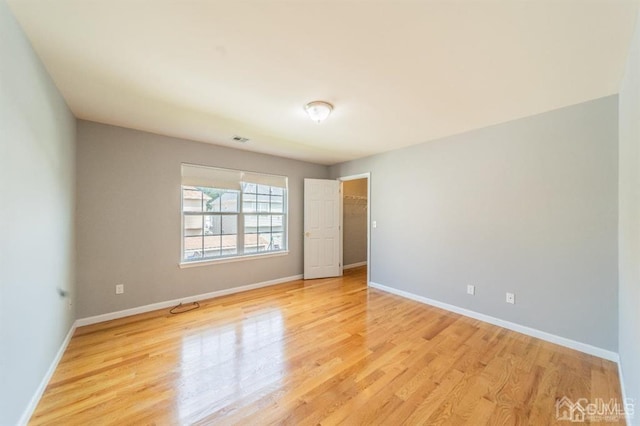 58 S Whittier St, Carteret, NJ 07008 - unfurnished room featuring light wood-style floors