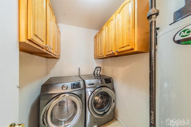 58 S Whittier St, Carteret, NJ 07008 - clothes washing area featuring separate washer and dryer and cabinet space
