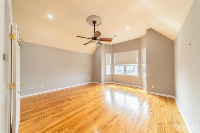 58 S Whittier St, Carteret, NJ 07008 - empty room featuring baseboards, a ceiling fan, light wood-style flooring, and lofted ceiling
