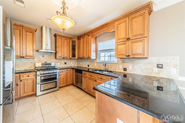 58 S Whittier St, Carteret, NJ 07008 - kitchen with wall chimney range hood, decorative backsplash, stainless steel appliances, and a sink