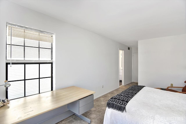 bedroom featuring light carpet and visible vents