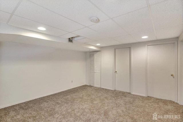 interior space featuring recessed lighting, visible vents, carpet floors, and a drop ceiling