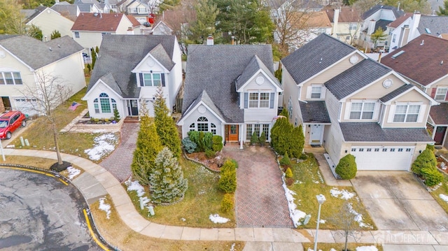 birds eye view of property with a residential view