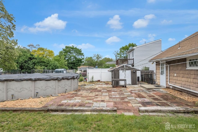 49 Charles Ter, Piscataway, NJ 08854 - fenced backyard with a storage shed and a patio area