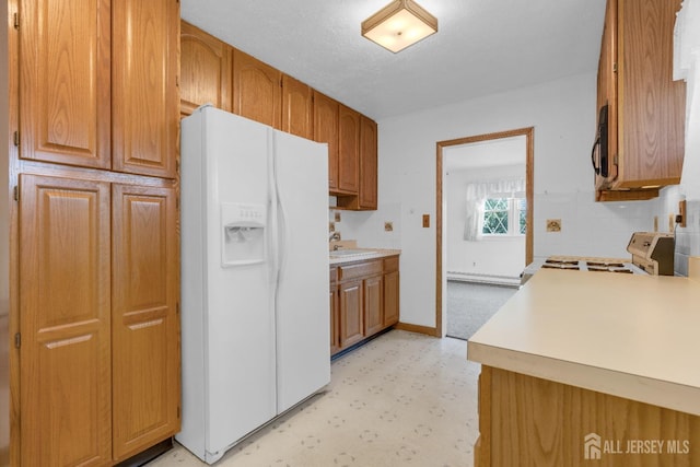 49 Charles Ter, Piscataway, NJ 08854 - kitchen featuring white appliances, light floors, light countertops, and brown cabinetry