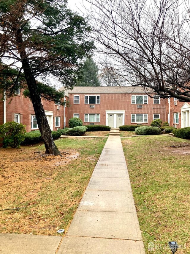 view of community with a lawn