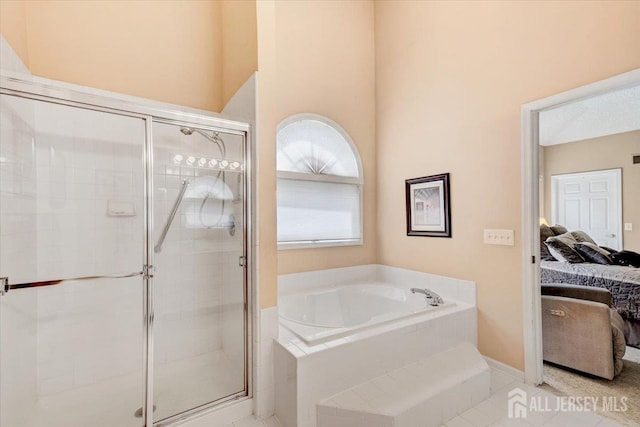 35 Brighton Ct, Monroe, NJ 08831 - ensuite bathroom with a bath, a stall shower, tile patterned flooring, a high ceiling, and baseboards