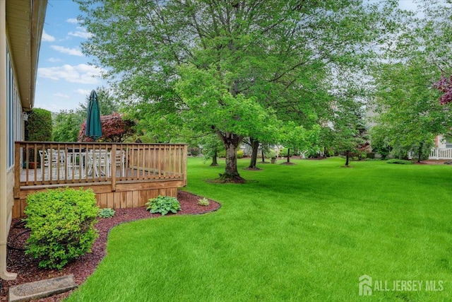 35 Brighton Ct, Monroe, NJ 08831 - view of green lawn featuring a deck
