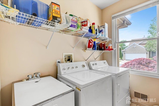 35 Brighton Ct, Monroe, NJ 08831 - laundry room featuring washing machine and clothes dryer