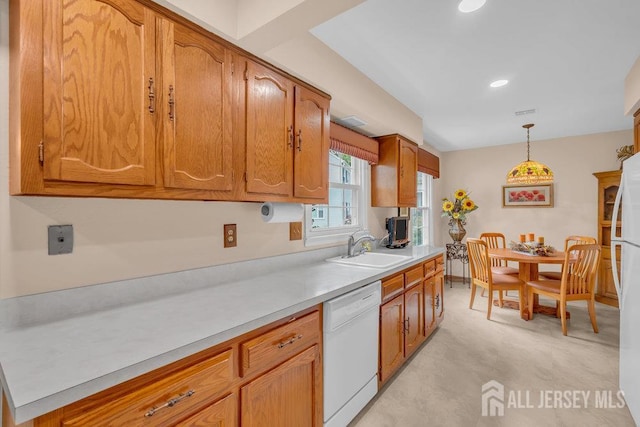 539 Old Nassau Rd Unit B, Monroe, NJ 08831 - kitchen featuring dishwasher, brown cabinetry, light countertops, decorative light fixtures, and recessed lighting