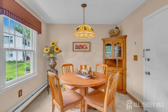 539 Old Nassau Rd Unit B, Monroe, NJ 08831 - dining space with baseboard heating, plenty of natural light, and baseboards