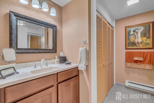 539 Old Nassau Rd Unit B, Monroe, NJ 08831 - bathroom with a baseboard radiator, vanity, and a closet