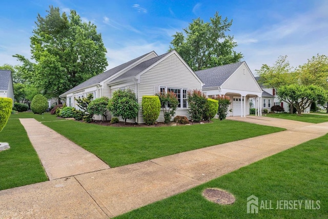 539 Old Nassau Rd Unit B, Monroe, NJ 08831 - view of front of home featuring a front lawn, driveway, a garage, and roof with shingles