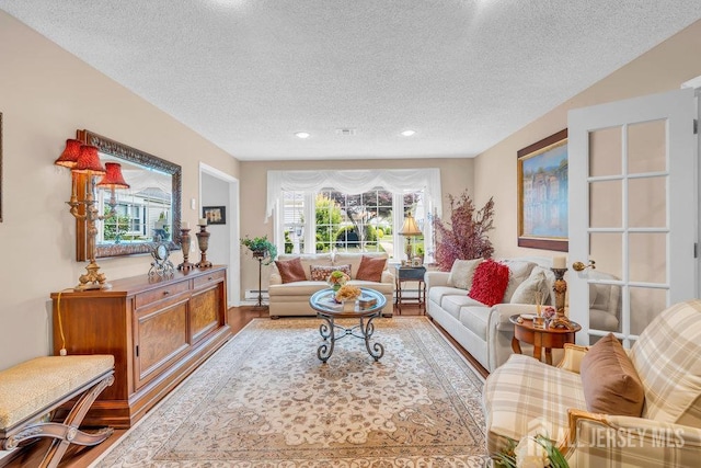 539 Old Nassau Rd Unit B, Monroe, NJ 08831 - living area with a textured ceiling, wood finished floors, and recessed lighting