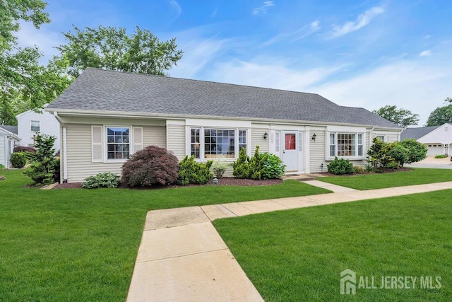 539 Old Nassau Rd Unit B, Monroe, NJ 08831 - cape cod home featuring a front yard and a shingled roof