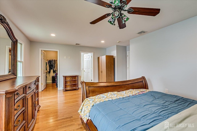 878 Beatrice Pkwy, Edison, NJ 08820 - bedroom featuring a spacious closet, light wood-style flooring, recessed lighting, a ceiling fan, and baseboards