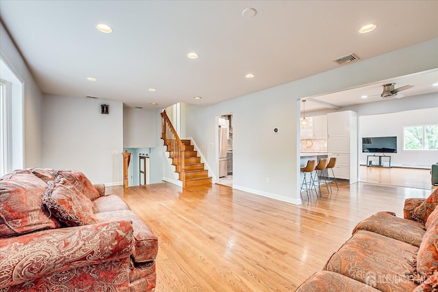 878 Beatrice Pkwy, Edison, NJ 08820 - living room featuring stairway, recessed lighting, light wood finished floors, and baseboards