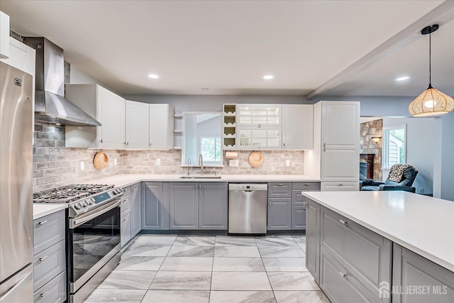 878 Beatrice Pkwy, Edison, NJ 08820 - kitchen featuring gray cabinets, appliances with stainless steel finishes, a sink, wall chimney range hood, and open shelves