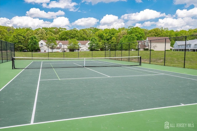 922 Thomas Ave, North Brunswick, NJ 08902 - view of tennis court with fence and community basketball court