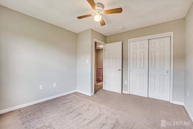 922 Thomas Ave, North Brunswick, NJ 08902 - unfurnished bedroom with carpet, baseboards, a closet, and a ceiling fan