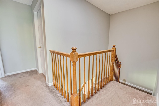 922 Thomas Ave, North Brunswick, NJ 08902 - staircase featuring carpet floors and baseboards