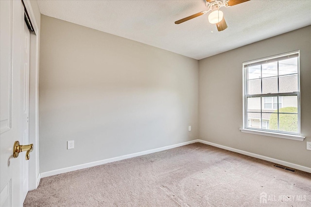 922 Thomas Ave, North Brunswick, NJ 08902 - carpeted spare room with baseboards and ceiling fan