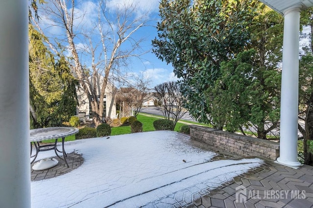 surrounding community featuring a patio