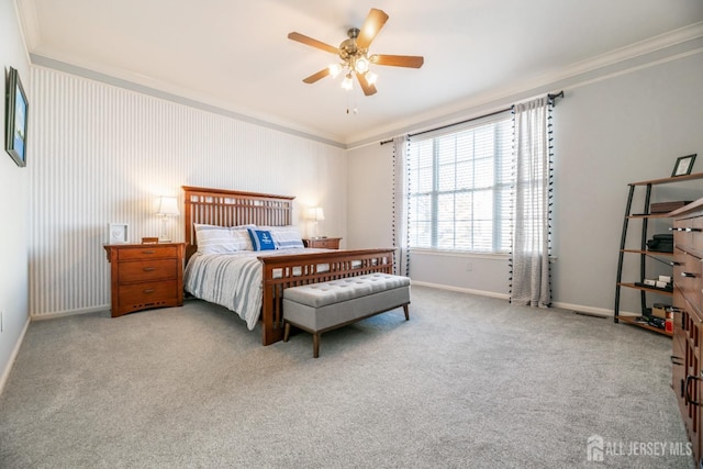 bedroom featuring light carpet, ornamental molding, and ceiling fan