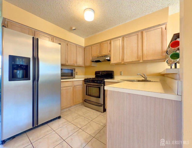 67 Nova Dr, Piscataway, NJ 08854 - kitchen featuring stainless steel appliances, light brown cabinets, under cabinet range hood, a textured ceiling, and light countertops