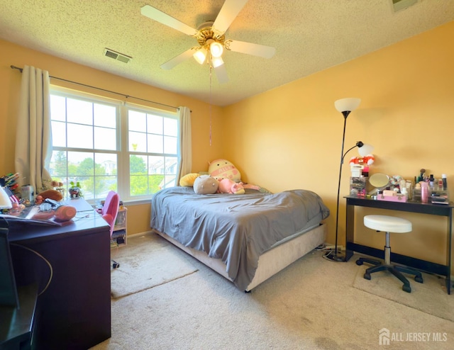67 Nova Dr, Piscataway, NJ 08854 - bedroom with carpet floors, a textured ceiling, a desk, a ceiling fan, and baseboards
