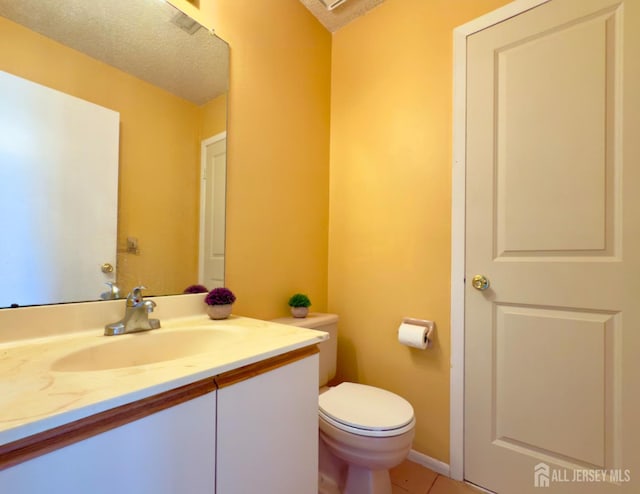 67 Nova Dr, Piscataway, NJ 08854 - half bathroom with vanity, toilet, and tile patterned flooring
