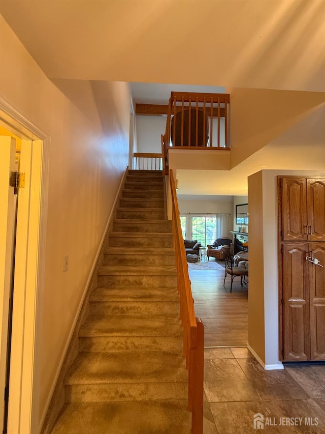 1014 Hemlock Ct, South Brunswick, NJ 08852 - stairway featuring baseboards