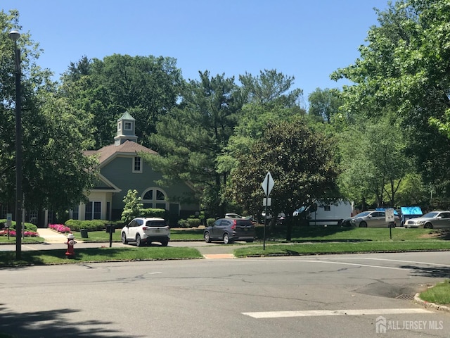 1014 Hemlock Ct, South Brunswick, NJ 08852 - view of asphalt street with curbs and traffic signs