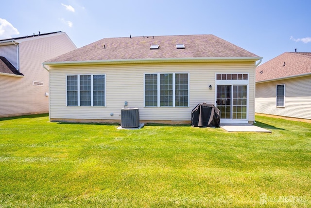 9 Copernicus Ct, East Windsor, NJ 08512 - back of house featuring a yard and roof with shingles