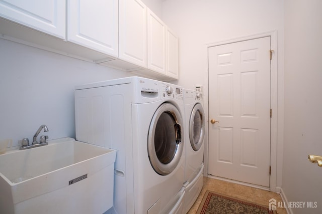 9 Copernicus Ct, East Windsor, NJ 08512 - laundry area featuring cabinet space, independent washer and dryer, and light tile patterned floors