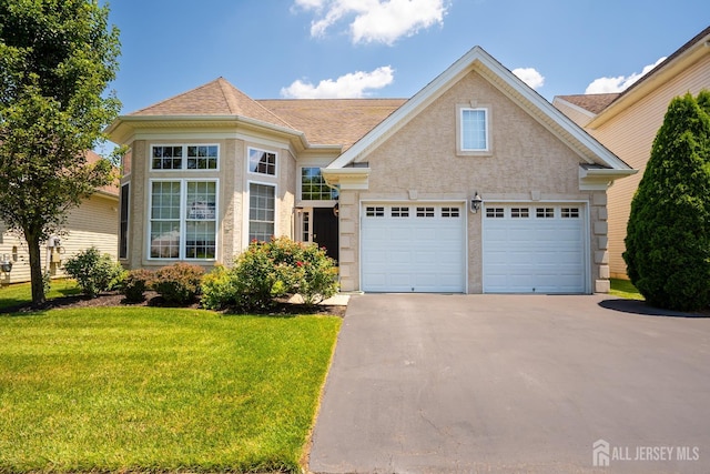 9 Copernicus Ct, East Windsor, NJ 08512 - traditional home with driveway, a front lawn, and roof with shingles