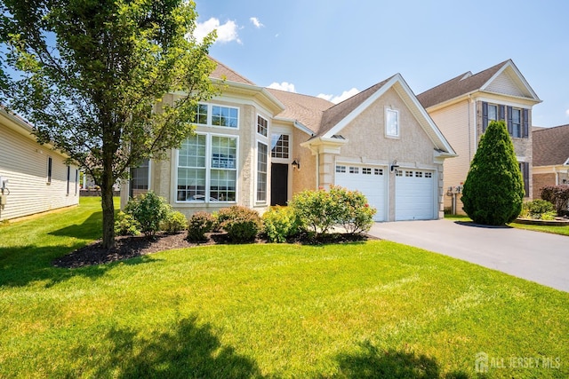 9 Copernicus Ct, East Windsor, NJ 08512 - view of front of house featuring concrete driveway, a garage, a front yard, and roof with shingles