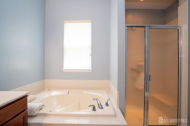 9 Copernicus Ct, East Windsor, NJ 08512 - bathroom with a bath, vanity, and a stall shower
