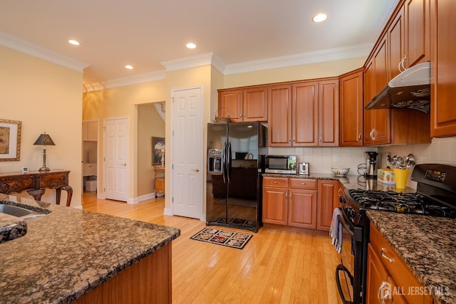 9 Copernicus Ct, East Windsor, NJ 08512 - kitchen with black appliances, range hood, ornamental molding, brown cabinets, and light wood finished floors