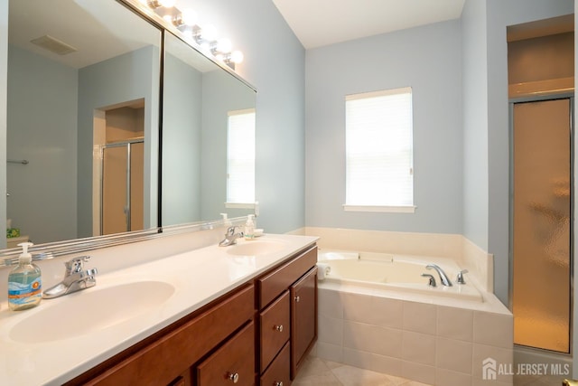 9 Copernicus Ct, East Windsor, NJ 08512 - bathroom featuring a stall shower, double vanity, a garden tub, and tile patterned floors