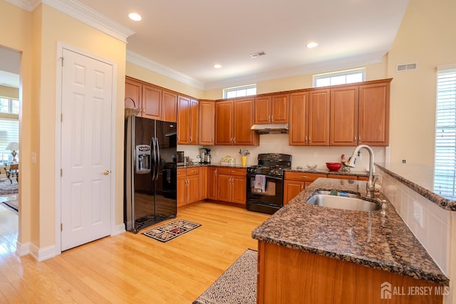 9 Copernicus Ct, East Windsor, NJ 08512 - kitchen with black appliances, light wood-style flooring, plenty of natural light, ornamental molding, and recessed lighting