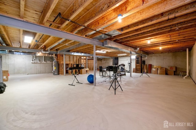 unfinished basement with water heater