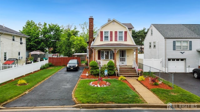 113 Coleman St, Middlesex, NJ 08846 - dutch colonial with a gambrel roof, asphalt driveway, an attached garage, a chimney, and a porch