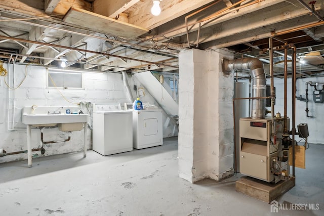 113 Coleman St, Middlesex, NJ 08846 - unfinished below grade area featuring washer and clothes dryer, a sink, and gas meter