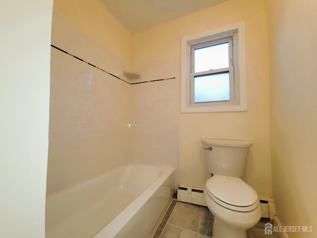 bathroom featuring a baseboard heating unit, tile patterned floors, toilet, and baseboards