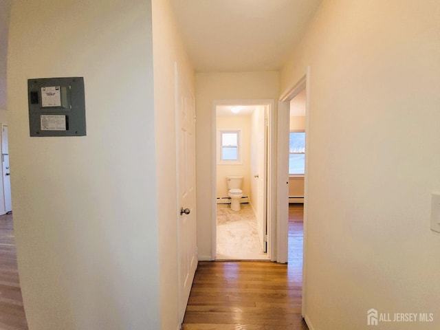 corridor with wood finished floors